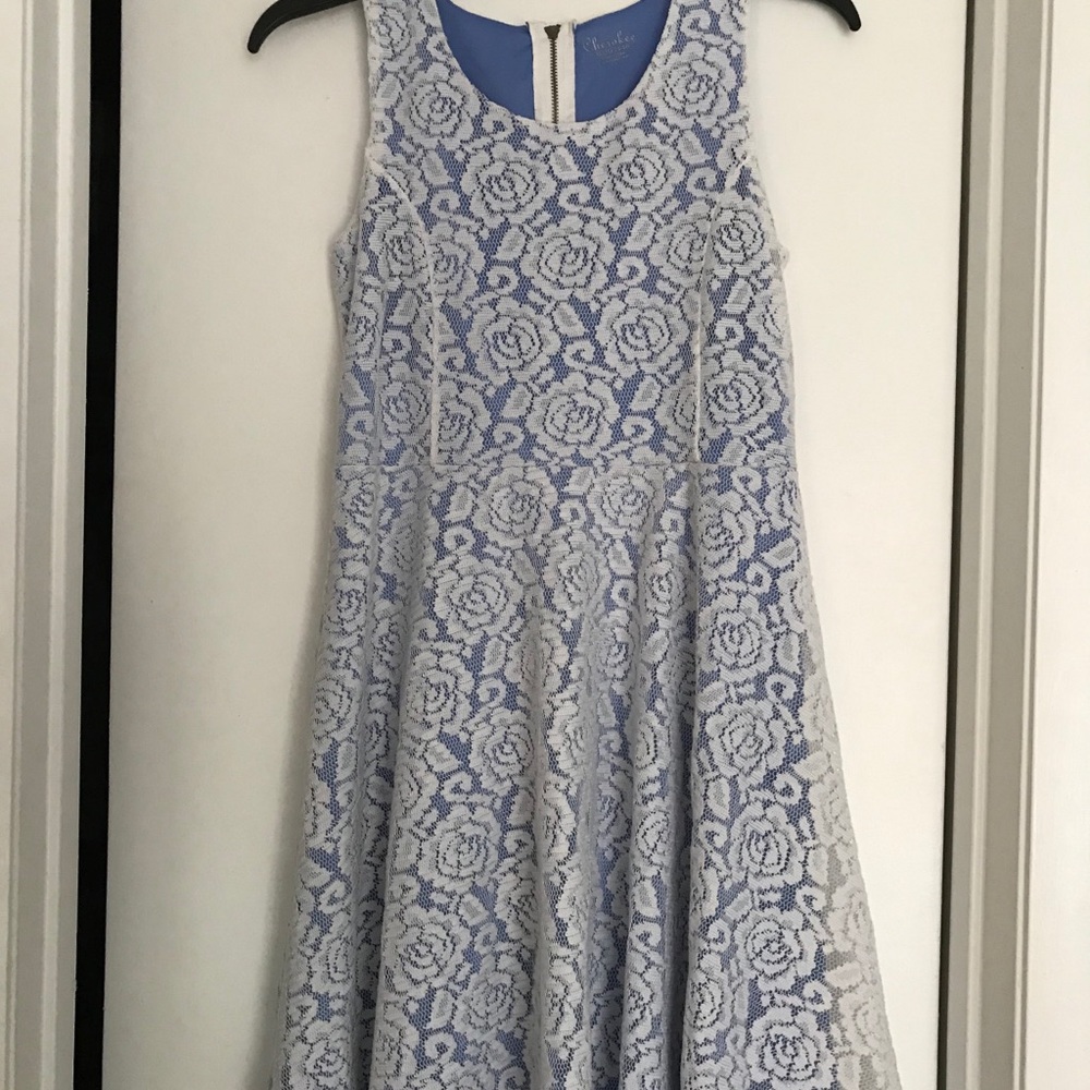 A beautiful periwinkle and white dress.